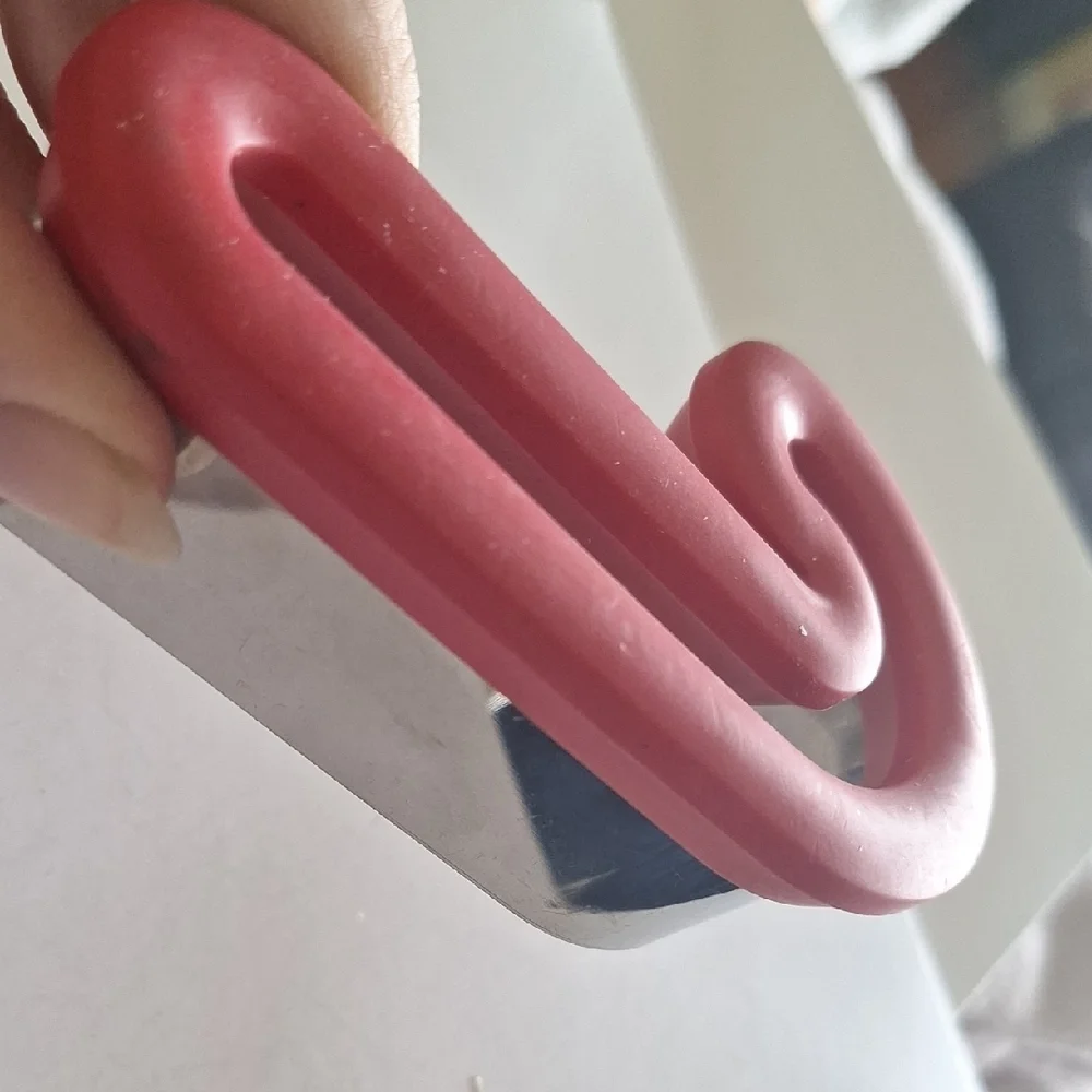 Red Candy Cane Shaped Object